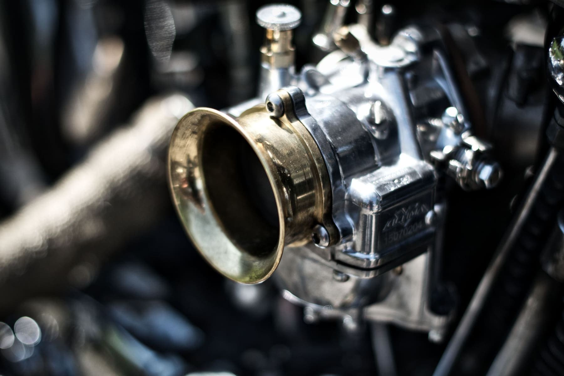 Chrome carburetor on a small engine