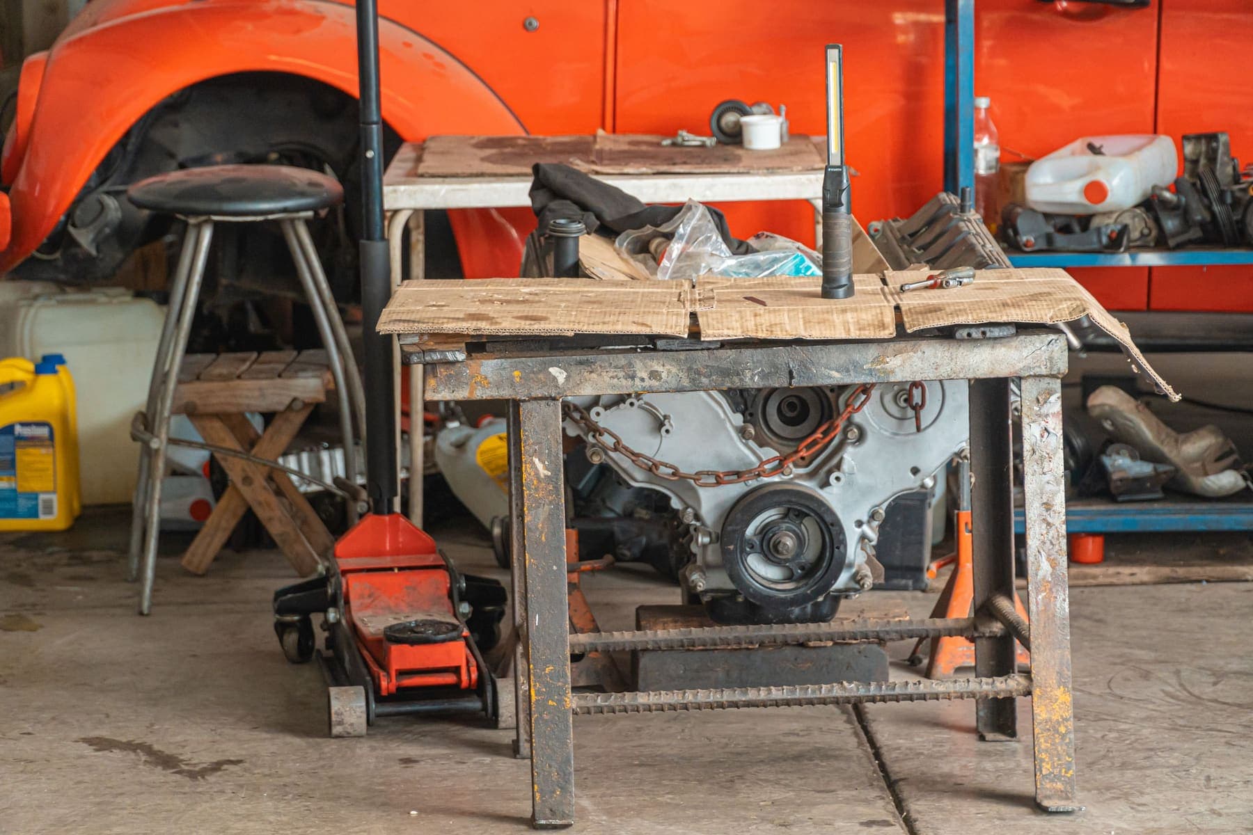 Workshop bench with engine parts